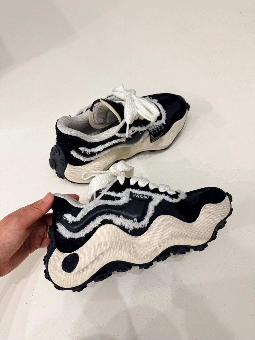 heyday Black and White Wavy-Trim Sneakers